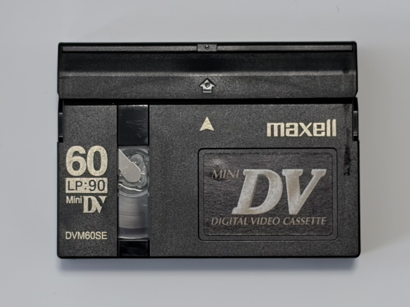 A MiniDV tape on a white background