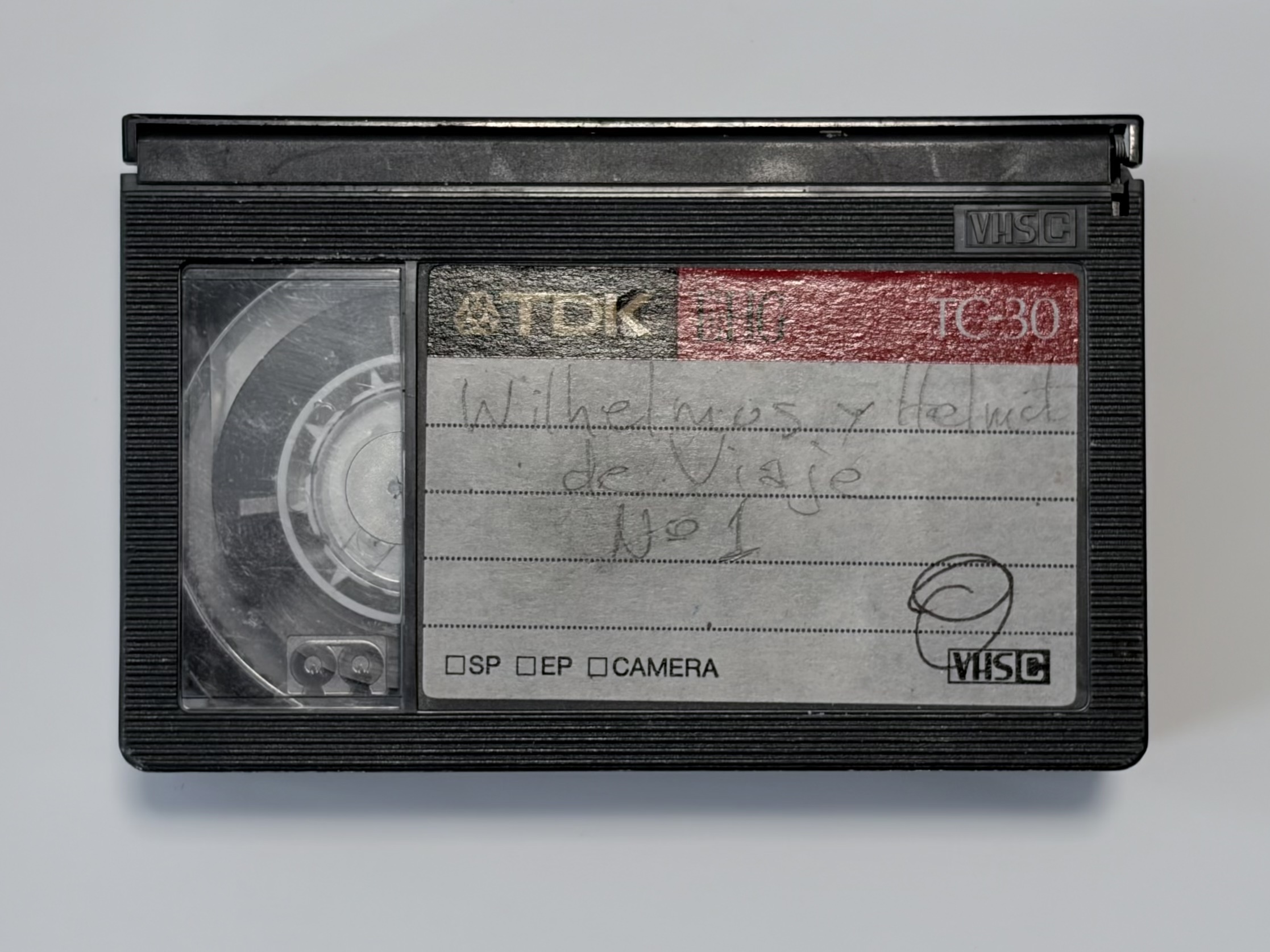 A VHS-C tape on a white background